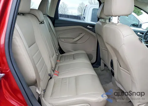 2016 Ford Escape Titanium z USA, uszkodzony, nr VIN 1FMCU9J91GUA95573